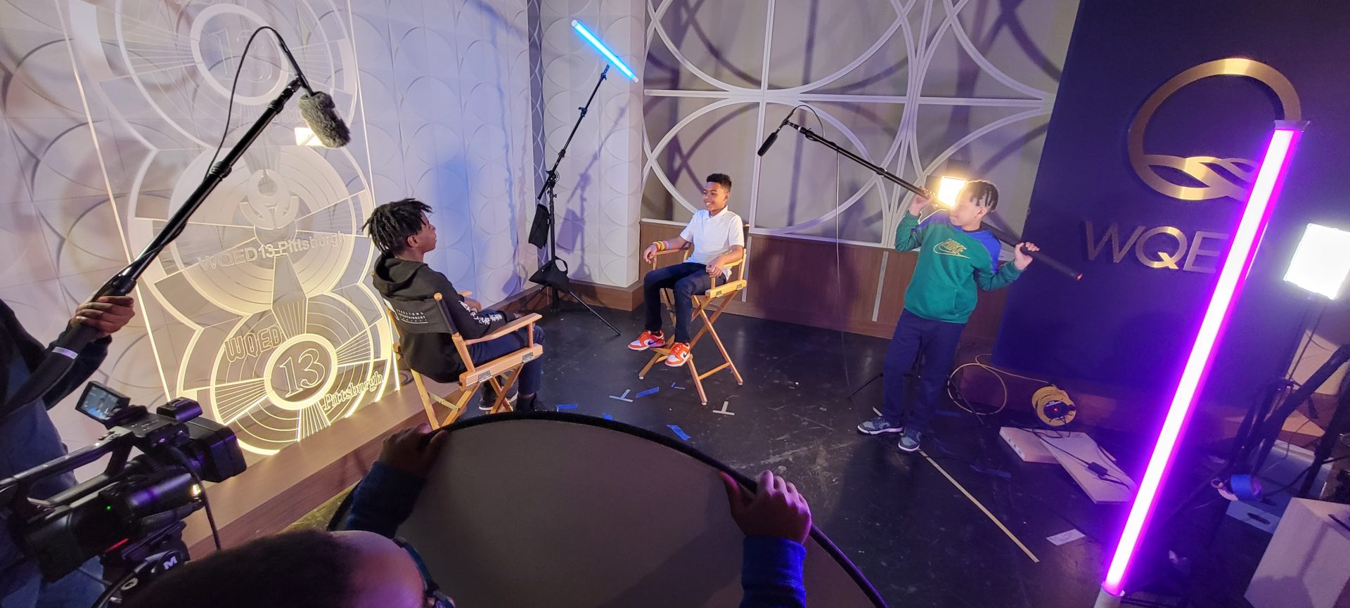 Students in the studio filming