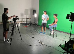 Students making film on green screen