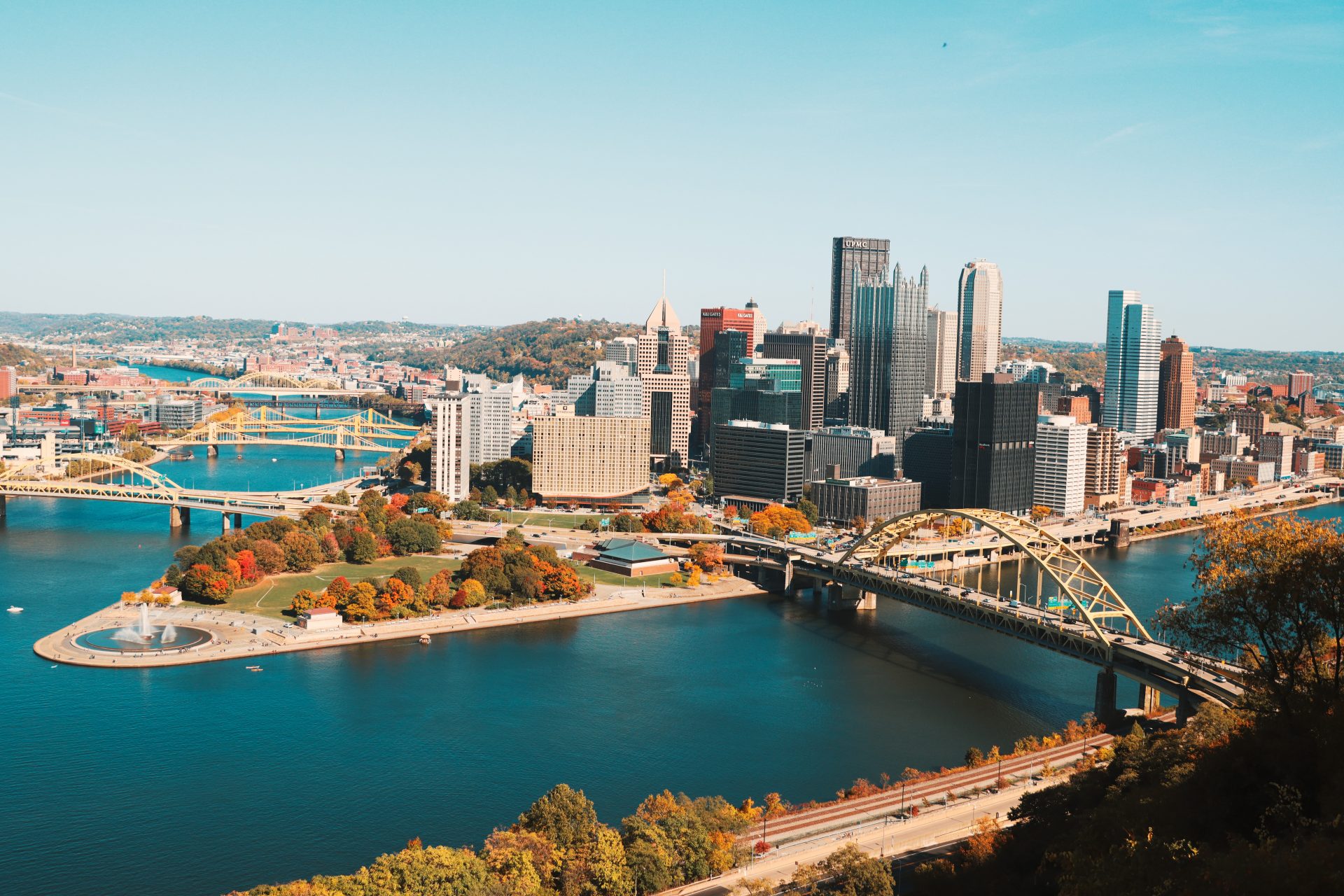 View of the Point in downtown Pittsburgh at the confluence of the Allegheny, Monongahela and Ohio Rivers in Fall.