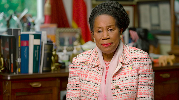Sheila Jackson seated being interviewed