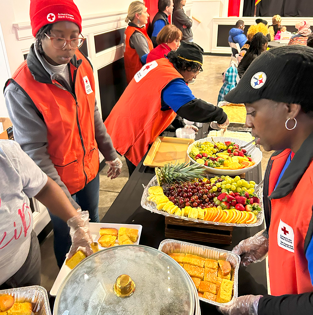 Volunteers passing out food