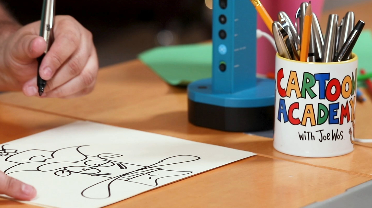 Cartoon academy desk and drawing